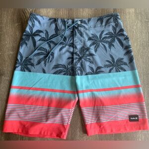 Hurley men's surfer shorts for sale. Red and blue, partly striped, like new.